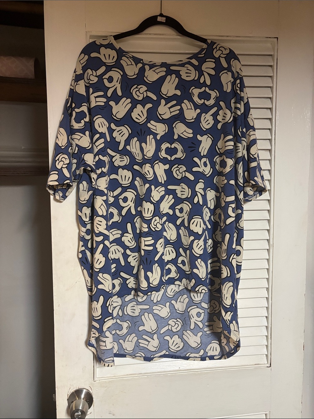 Lula Roe Irma Disney Blur Short-Sleeve Women’s Top with Cream Hand Pattern